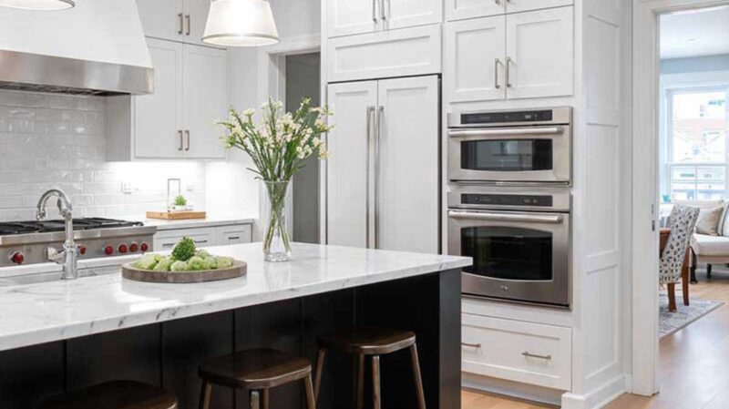 Sophisticated custom kitchen with island and premium appliances